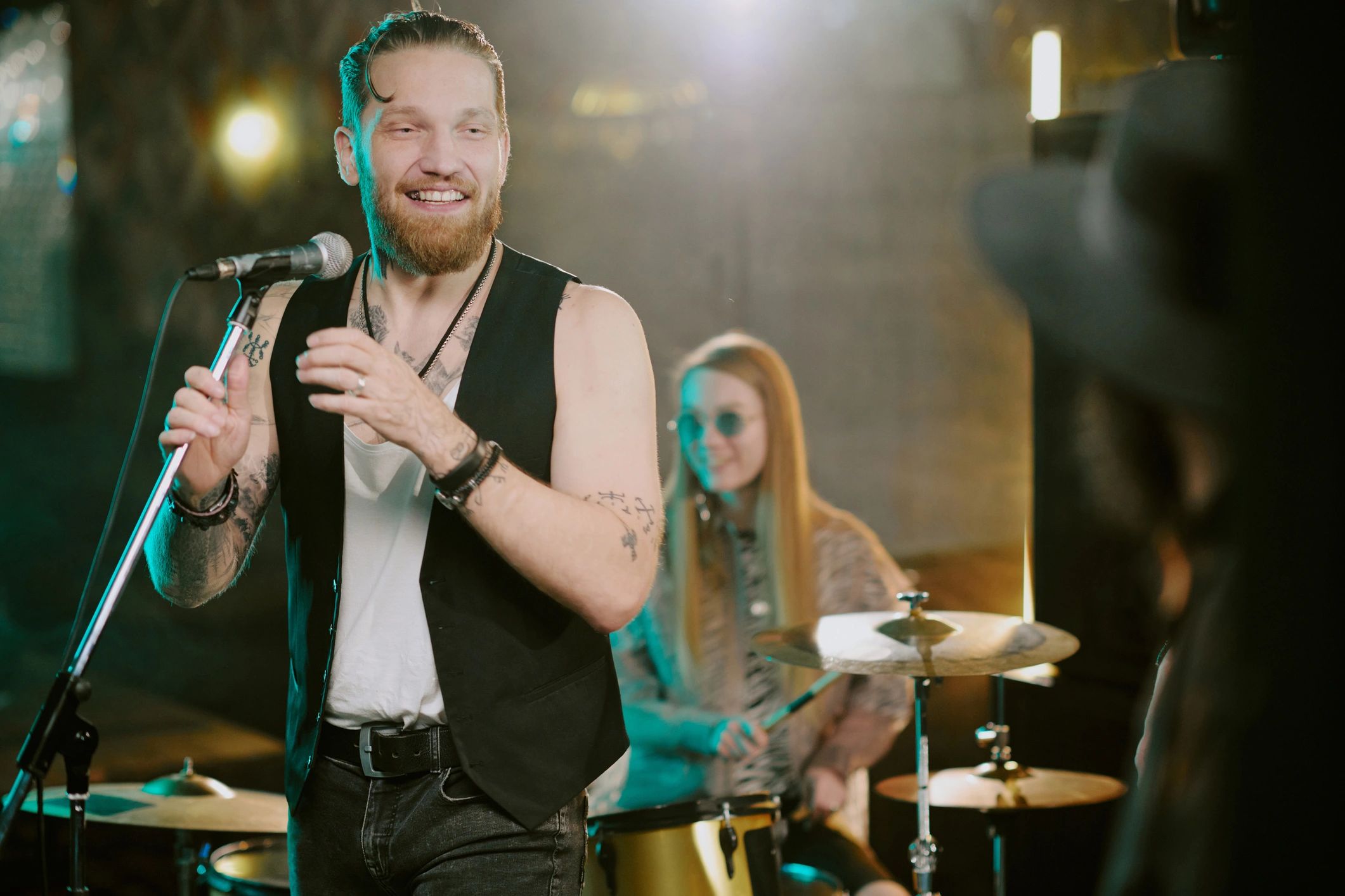 Rock vocalist performing during a live show